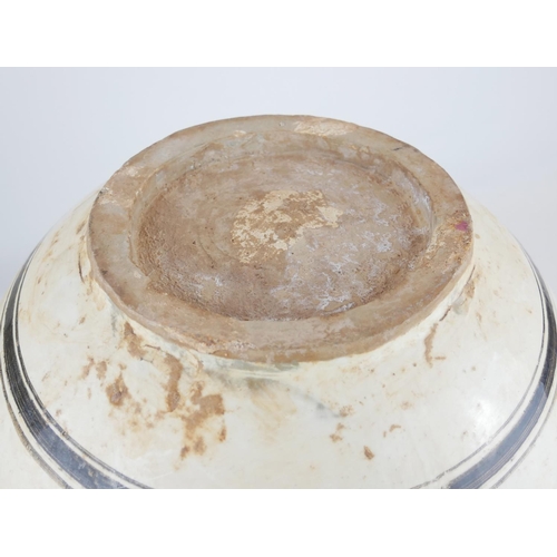 269 - A LARGE 19TH CENTURY CHINESE POTTERY CIZHOU GLAZE JARDINIÈRE
Spherical form with brown glaze decorat... 