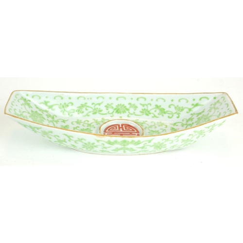 273 - A CHINESE PORCELAIN SHALLOW 'BOAT' FORM DISH
Having green lotus decoration and Qianlong blue square ... 
