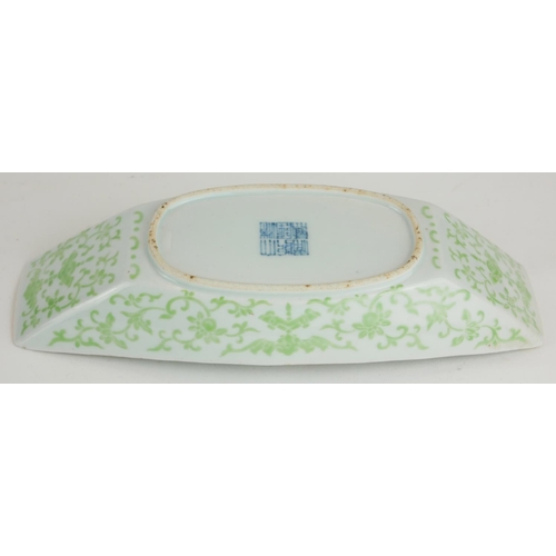 273 - A CHINESE PORCELAIN SHALLOW 'BOAT' FORM DISH
Having green lotus decoration and Qianlong blue square ... 