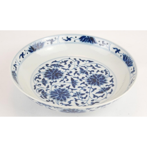 275 - A CHINESE BLUE AND WHITE PORCELAIN 'LOTUS' SHALLOW BOWL
Hand painted scrolled floral decoration, bea... 