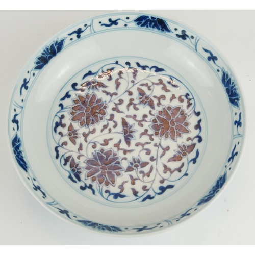 275 - A CHINESE BLUE AND WHITE PORCELAIN 'LOTUS' SHALLOW BOWL
Hand painted scrolled floral decoration, bea... 