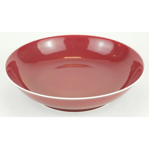 276 - A CHINESE PORCELAIN OX BLOOD GLAZE SHALLOW BOWL
With Qianlong 1736 - 1795 blue seal mark to base.
(a... 