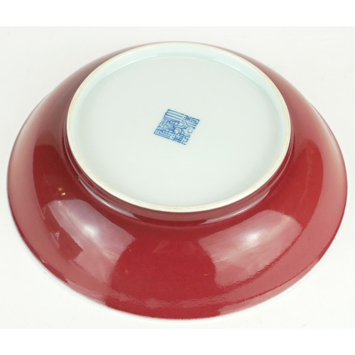 276 - A CHINESE PORCELAIN OX BLOOD GLAZE SHALLOW BOWL
With Qianlong 1736 - 1795 blue seal mark to base.
(a... 