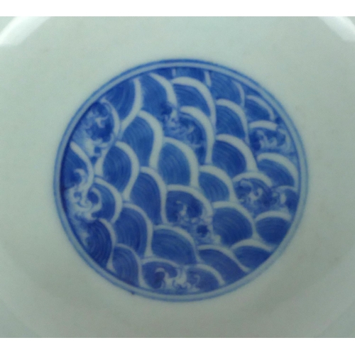 277 - A CHINESE BLUE AND WHITE PORCELAIN 'FIVE TOE DRAGON' BOWL
Decorated with dragons chasing a flaming p... 