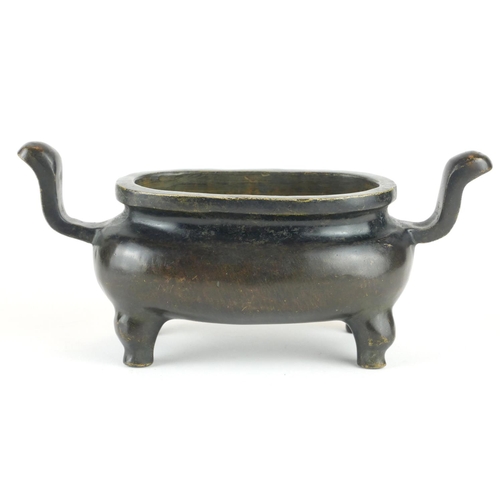 279 - A CHINESE BRONZE CENSER
Having twin handles and raised on four legs, bearing a cast Xuande 1425 - 14... 