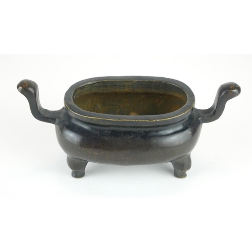 279 - A CHINESE BRONZE CENSER
Having twin handles and raised on four legs, bearing a cast Xuande 1425 - 14... 