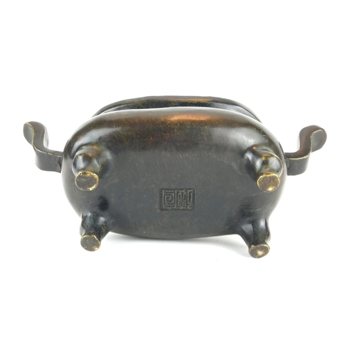 279 - A CHINESE BRONZE CENSER
Having twin handles and raised on four legs, bearing a cast Xuande 1425 - 14... 