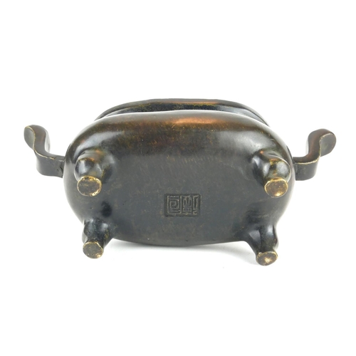 279 - A CHINESE BRONZE CENSER
Having twin handles and raised on four legs, bearing a cast Xuande 1425 - 14... 