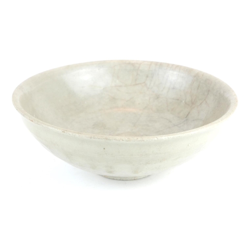 280 - A CHINESE CELEDON GLAZED POTTERY SHALLOW BOWL
With unglazed footrim.
(approx 18cm x 7cm)