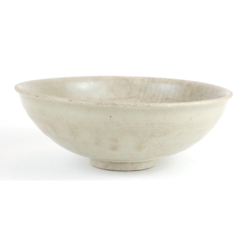 280 - A CHINESE CELEDON GLAZED POTTERY SHALLOW BOWL
With unglazed footrim.
(approx 18cm x 7cm)