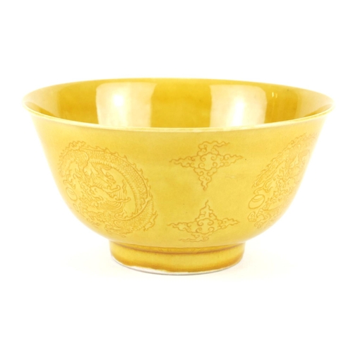 281 - A CHINESE YELLOW GLAZE BOWL
Having incised underglaze decoration of a dragon with flaming pearl, bea... 