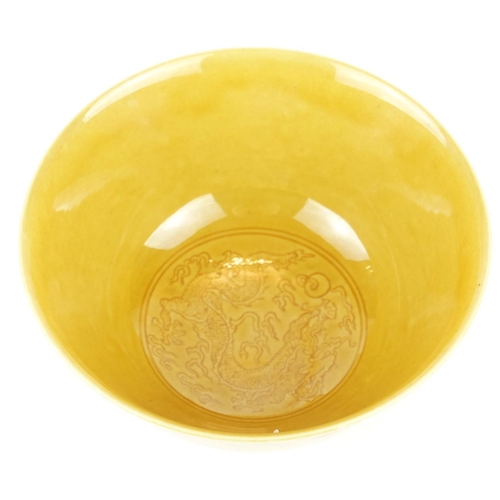 281 - A CHINESE YELLOW GLAZE BOWL
Having incised underglaze decoration of a dragon with flaming pearl, bea... 