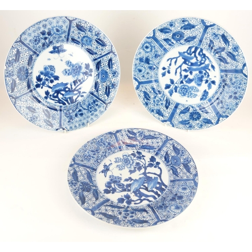 282 - A SET OF THREE CHINESE PORCELAIN BLUE AND WHITE PLATES
Having a wide sectional border and decorated ... 