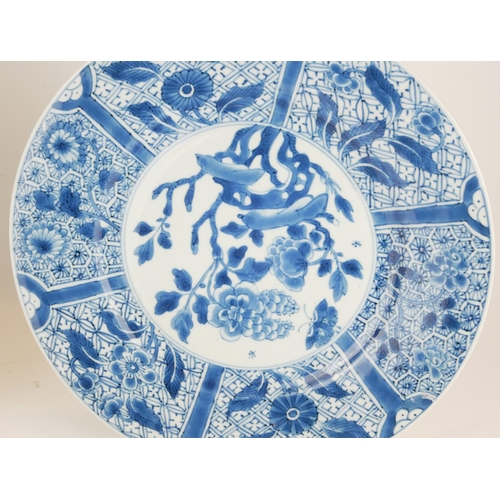 282 - A SET OF THREE CHINESE PORCELAIN BLUE AND WHITE PLATES
Having a wide sectional border and decorated ... 