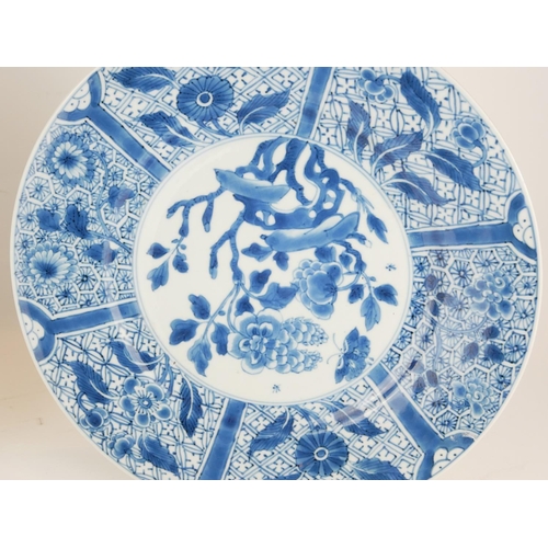 282 - A SET OF THREE CHINESE PORCELAIN BLUE AND WHITE PLATES
Having a wide sectional border and decorated ... 
