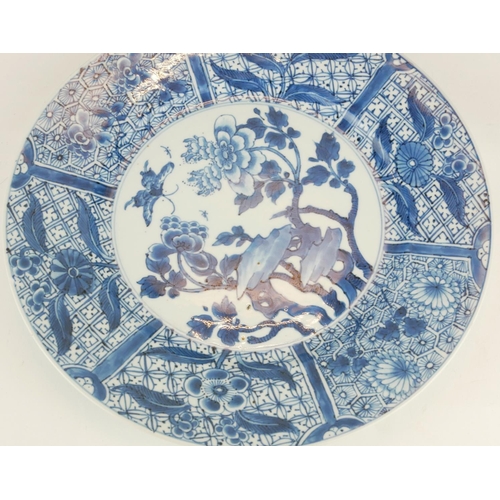 282 - A SET OF THREE CHINESE PORCELAIN BLUE AND WHITE PLATES
Having a wide sectional border and decorated ... 
