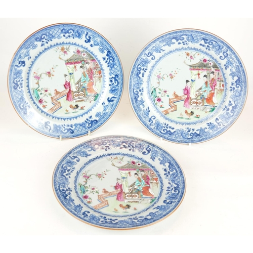 285 - A SET OF THREE CHINESE FAMILLE ROSE PORCELAIN PLATES
Each painted with figures in an exotic garden w... 