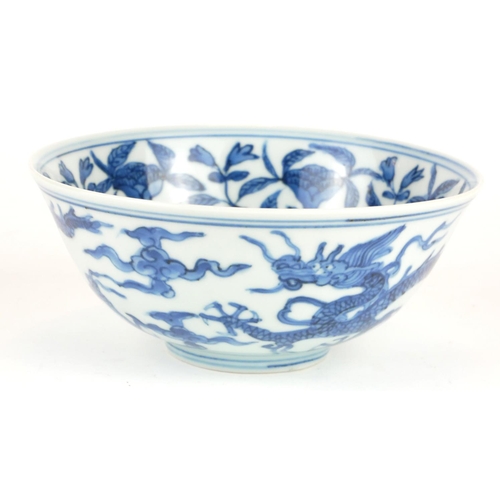 286 - A CHINESE BLUE AND WHITE PORCELAIN 'FIVE TOE DRAGON' BOWL
Hand painted with dragons amongst stylized... 