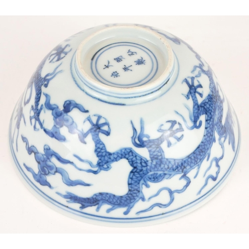 286 - A CHINESE BLUE AND WHITE PORCELAIN 'FIVE TOE DRAGON' BOWL
Hand painted with dragons amongst stylized... 