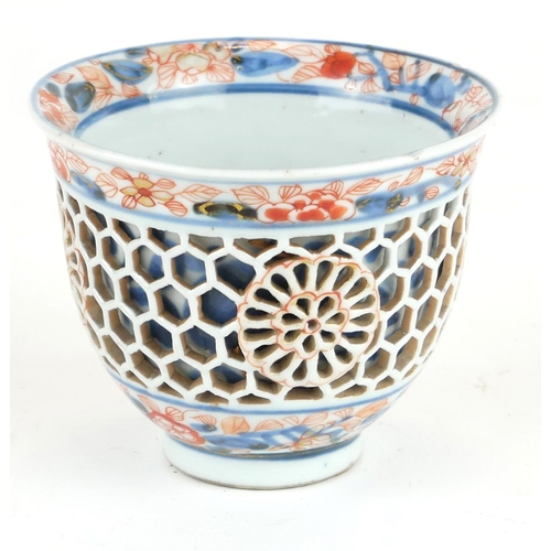 294 - A CHINESE IMARI PORCELAIN RETICULATED DOUBLE WALLED CUP
Having pierced honeycomb frame with undergla... 