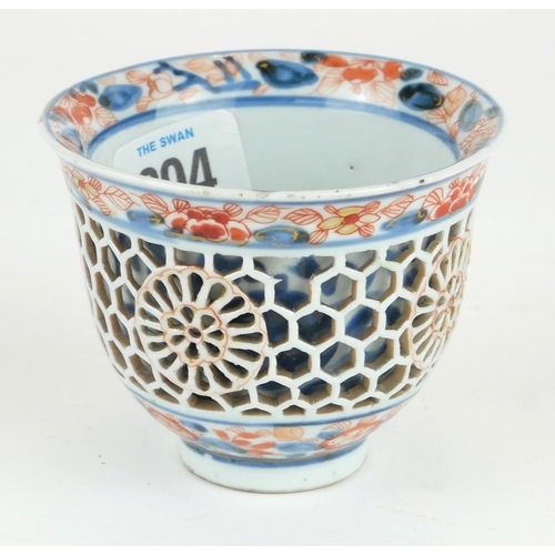 294 - A CHINESE IMARI PORCELAIN RETICULATED DOUBLE WALLED CUP
Having pierced honeycomb frame with undergla... 