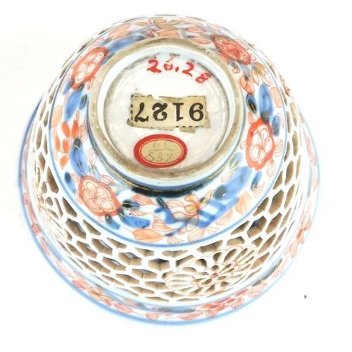 294 - A CHINESE IMARI PORCELAIN RETICULATED DOUBLE WALLED CUP
Having pierced honeycomb frame with undergla... 