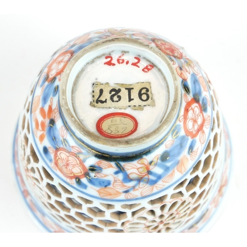 294 - A CHINESE IMARI PORCELAIN RETICULATED DOUBLE WALLED CUP
Having pierced honeycomb frame with undergla... 