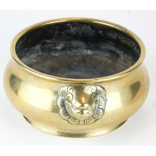 297 - A CHINESE BRONZE CENSER
Having twin lion mask handles, bearing a six character Ming Dynasty 1426 - 1... 