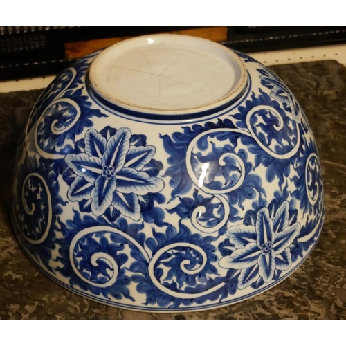 245a - A LARGE ORIENTAL BLUE AND WHITE PORCELAIN BOWL
Having an underglaze blue decoration of scrolled and ... 