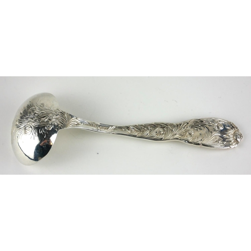 260 - TIFFANY AND CO., AN EARLY 20TH CENTURY AMERICAN STERLING SILVER LADLE
Having an embossed Art Nouveau... 