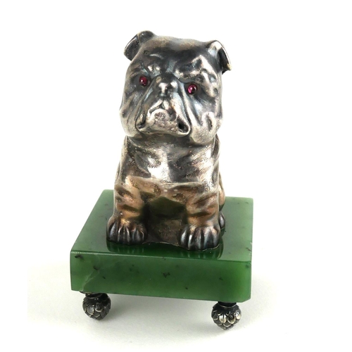 265 - A RUSSIAN SILVER AND NEPHRITE JADE BULLDOG PAPERWEIGHT
Seated pose with garnet eyes, bearing ‘Kokovs... 