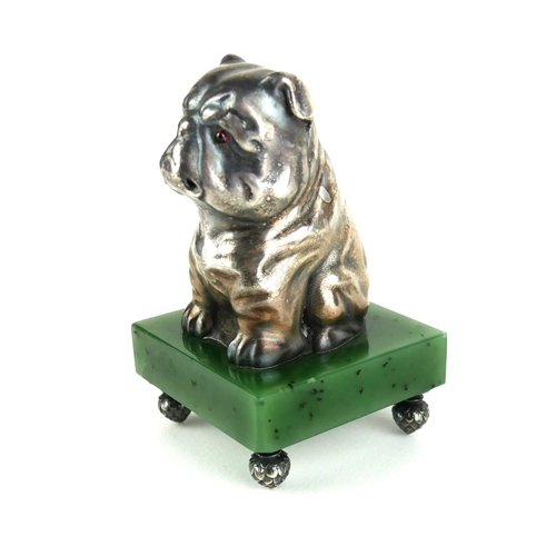 265 - A RUSSIAN SILVER AND NEPHRITE JADE BULLDOG PAPERWEIGHT
Seated pose with garnet eyes, bearing ‘Kokovs... 