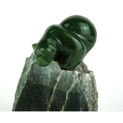 265A - AN EARLY 20TH CENTURY RUSSIAN NEPHRITE CARVED BEAR
Standing pose on granite rock plinth.
(bear appro... 