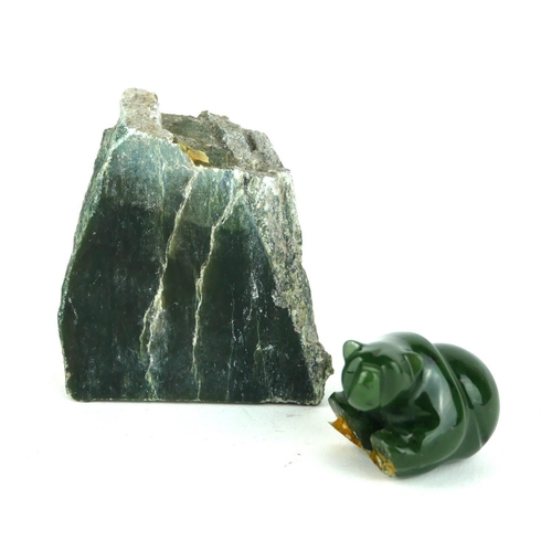 265A - AN EARLY 20TH CENTURY RUSSIAN NEPHRITE CARVED BEAR
Standing pose on granite rock plinth.
(bear appro... 