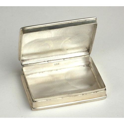 269A - A SILVER .925 PILL/SNUFF BOX 
Lid inset with plaque of a reclining nude female. 
(w 4.7cm)