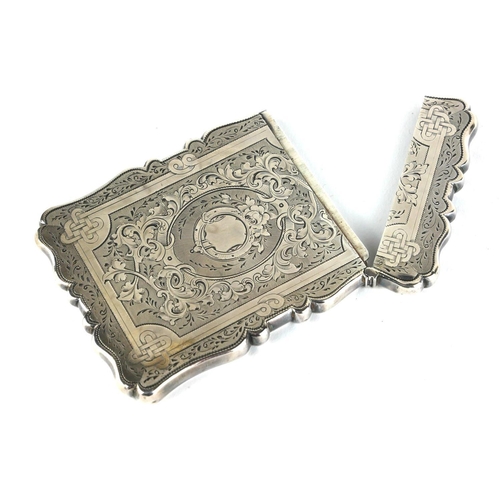 270 - A VICTORIAN SILVER CALLING CARD CASE
Having fine chased decoration, hallmarked Birmingham, 1865.
(ap... 