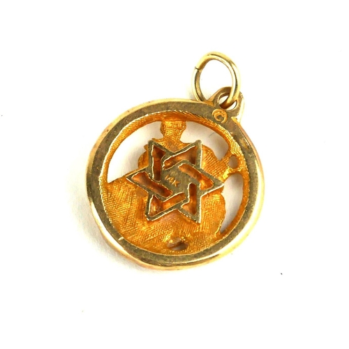 273 - A VINTAGE 14CT GOLD ST. CHRISTOPHER MEDALLION PENDANT
Having pierced figural design and Inscribed Sa... 