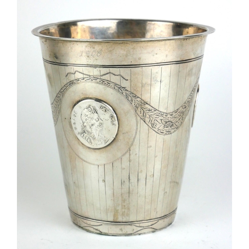 281 - A LARGE CONTINENTAL WHITE METAL COMMEMORATIVE BEAKER
Having fine engraved decoration and set with fo... 