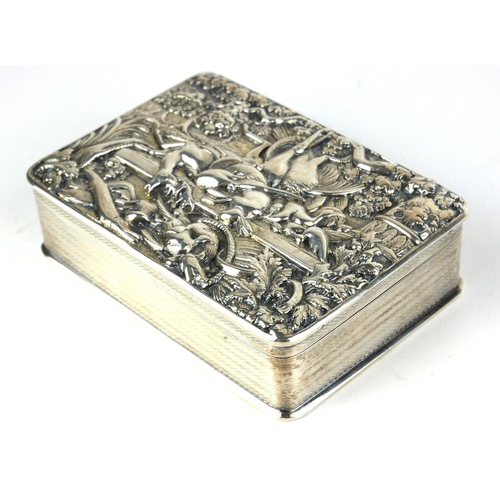 291 - A LARGE GEORGIAN SILVER SNUFF BOX
Having an embossed hunting scene to lid, hallmarked London, 1819, ... 