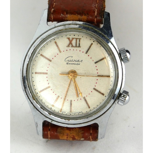 293A - A VINTAGE RUSSIAN STAINLESS STEEL GENT’S WRISTWATCH
Circular dial marked 'Cushan CCCP’, on brown lea... 