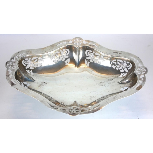 294A - A VINTAGE SILVER OVAL CAKE BASKET
Pierced decoration, on a pedestal base, hallmarked Sheffield, 1962... 