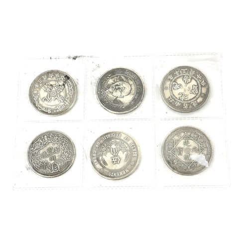 347 - A COLLECTION OF SIX CHINESE WHITE METAL MEDALLION COINS
Various designs including a five toe dragon ... 