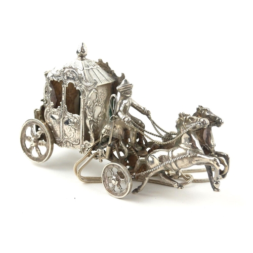 358 - AN EARLY 20TH CENTURY CONTINENTAL SILVER CARRIAGE AND HORSES SCULPTURE
Royal carriage with two drive... 