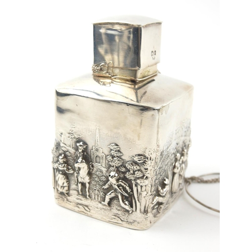 359 - AN EDWARDIAN SILVER SQUARE FORM TEA CANISTER
With embossed continuous 18th Century design landscape ... 