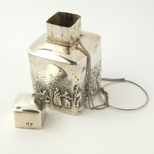 359 - AN EDWARDIAN SILVER SQUARE FORM TEA CANISTER
With embossed continuous 18th Century design landscape ... 