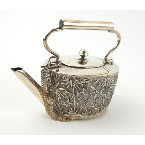 360 - A 19TH CENTURY CHINESE SILVER NOVELTY MINIATURE TEA KETTLE
With fine decoration of bamboo trees, mar... 