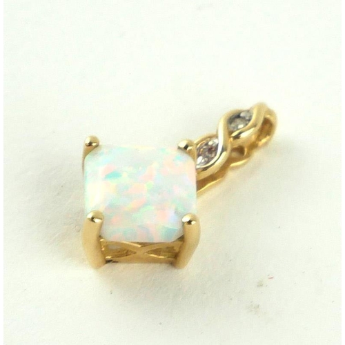 383 - A 14CT GOLD, OPAL AND DIAMOND PENDANT
The square cut opal with two round cut diamonds to bale.
(opal... 