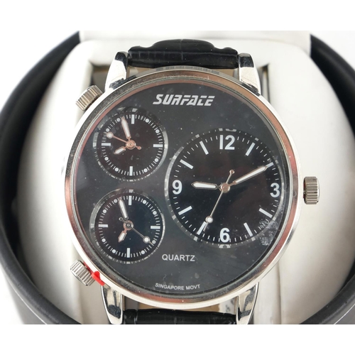 390 - SURFACE, A STAINLESS STEEL GENT’S WRISTWATCH
Having a black tone dial, two subsidiary dials and quar... 