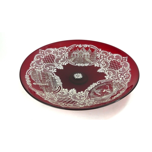 401A - A LARGE 20TH CENTURY VENETIAN RUBY GLASS CHARGER DISH
Hand painted with three landscape cartouches w... 