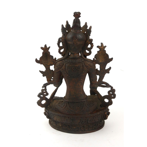 415 - A TIBETAN BRONZE LAKSHMI BUDDHA FIGURE
Seated pose flanked by two lotus flowers.
(approx 23cm)